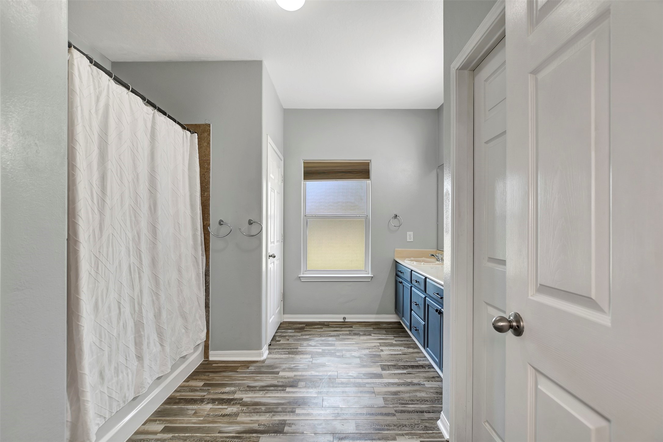 25896 Lake View Court West Hockley, TX 77447 - Photo 24 of 47 a view of a hallway with wooden floor and staircase