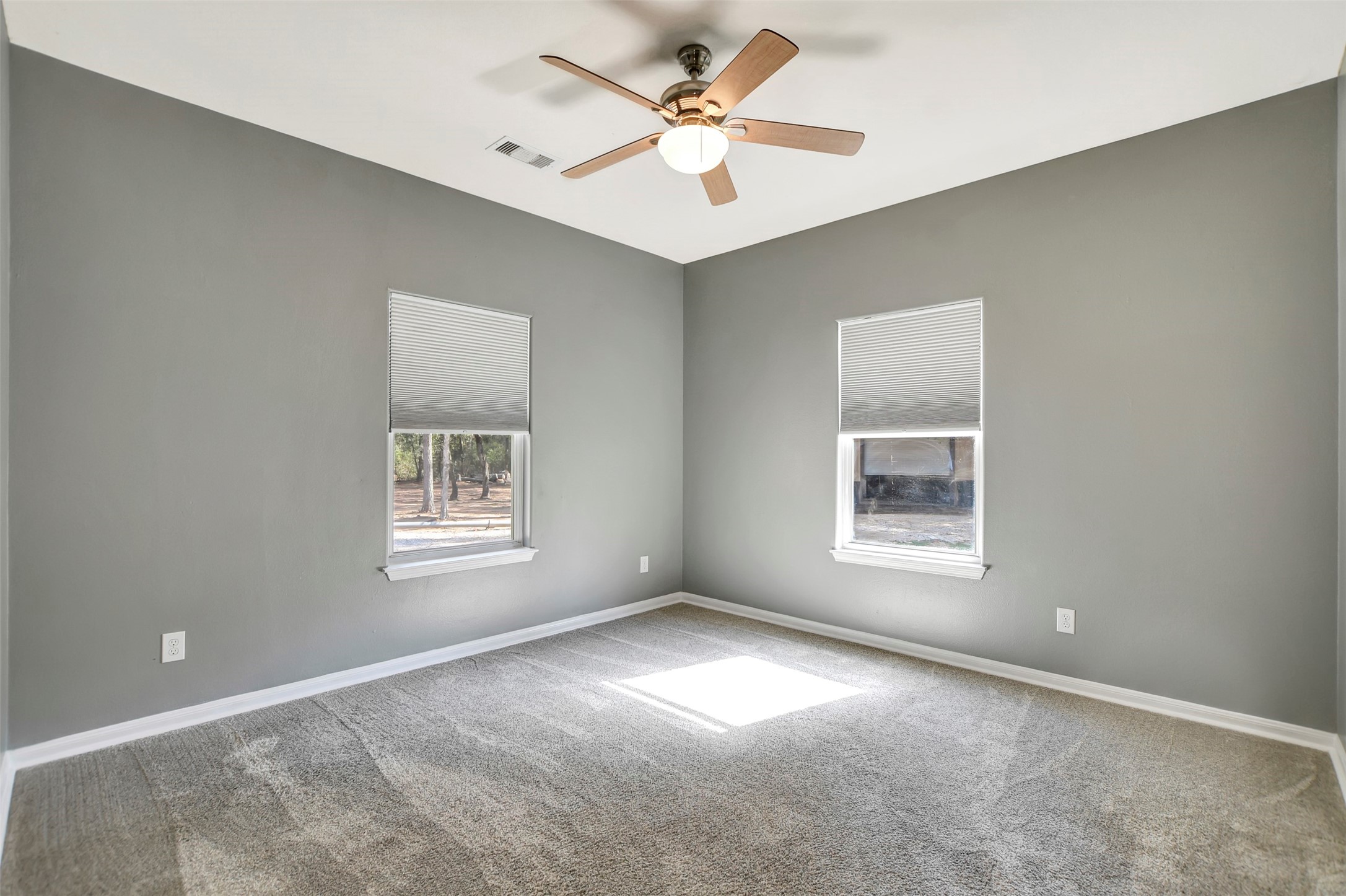 25896 Lake View Court West Hockley, TX 77447 - Photo 28 of 47 an empty room with a window and a fan