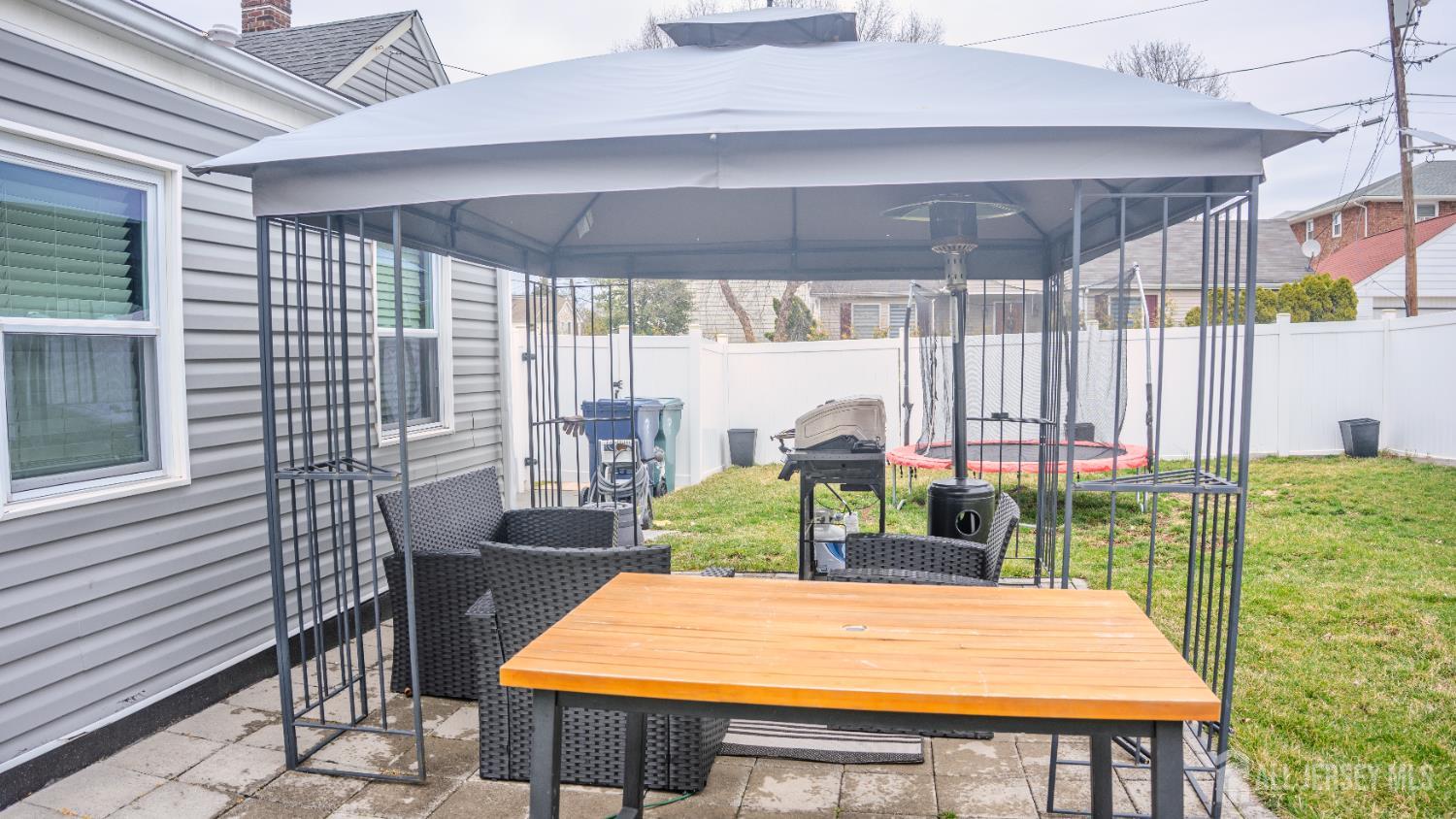 636 Lee Street Perth Amboy, NJ 08861 - Photo 11 of 35 a view of a patio with a table and chairs