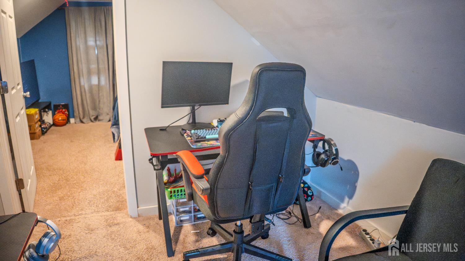 636 Lee Street Perth Amboy, NJ 08861 - Photo 21 of 35 a workspace with furniture and wooden floor