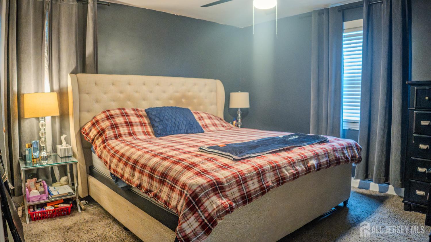 636 Lee Street Perth Amboy, NJ 08861 - Photo 27 of 35 a bedroom with a bed and a window