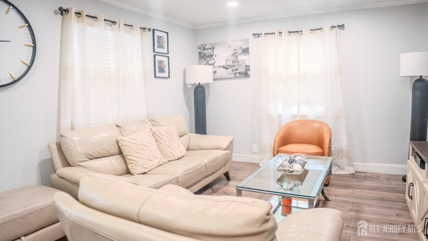 636 Lee Street Perth Amboy, NJ 08861 - Photo 3 of 35 a living room with furniture a rug and a window