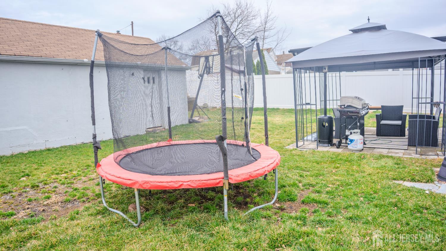 636 Lee Street Perth Amboy, NJ 08861 - Photo 32 of 35 a swimming pool with outdoor seating and yard