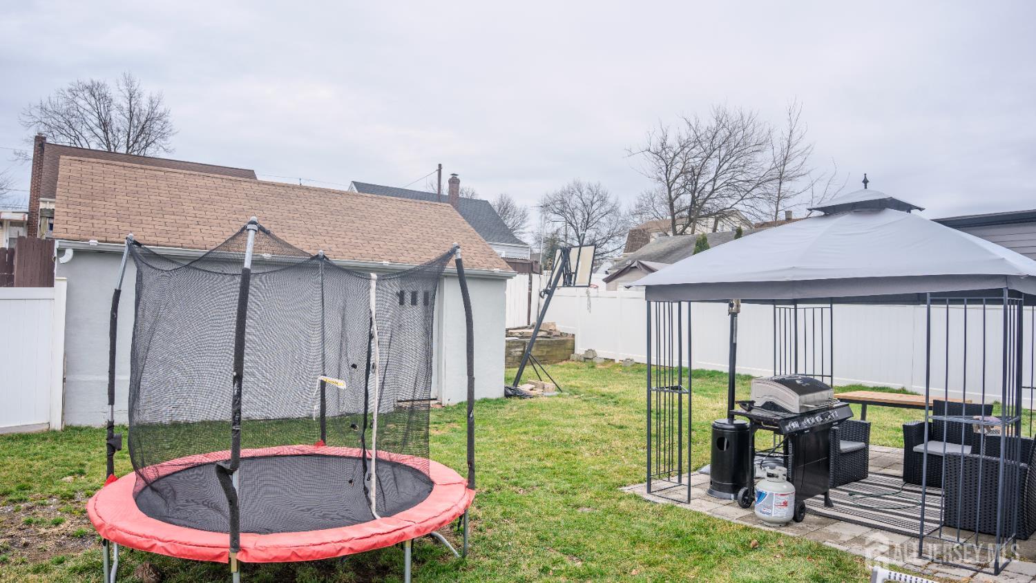 636 Lee Street Perth Amboy, NJ 08861 - Photo 33 of 35 a swimming pool with outdoor seating yard and barbeque oven