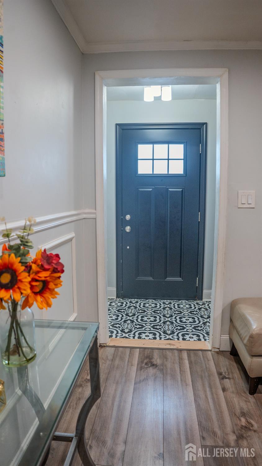 636 Lee Street Perth Amboy, NJ 08861 - Photo 6 of 35 view of room with window and wooden floor