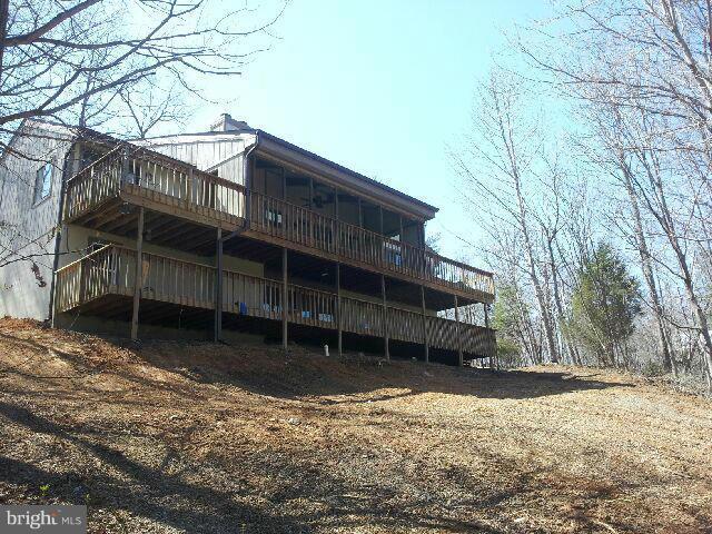 260 McCoys Ford Road Front Royal, VA 22630 - Photo 1 of 5 a view of house with a yard