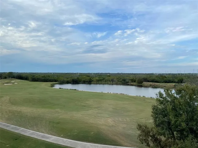 a view of lake and mountain