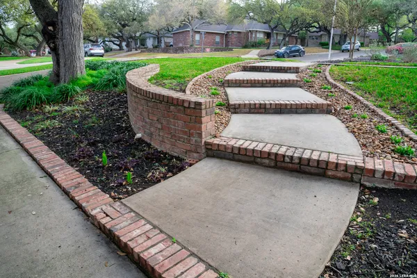 a view of backyard with green space
