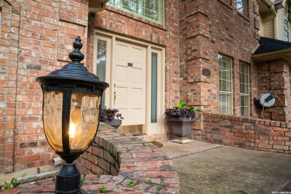 a view of an empty room with a fireplace