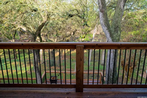 a kitchen with stainless steel appliances granite countertop a kitchen island a stove cabinets and a dining table