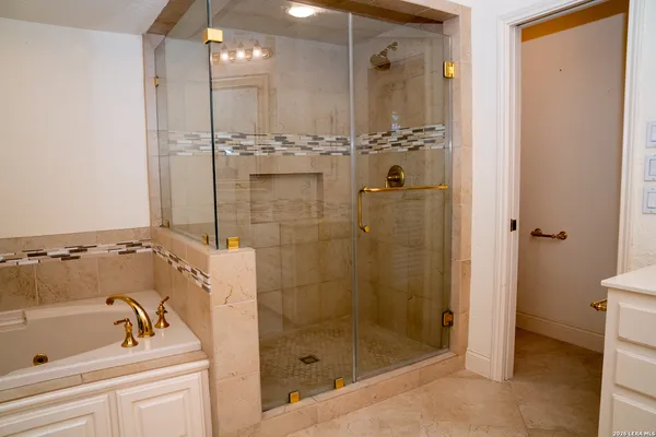 a view of entryway with wooden floor and stairs