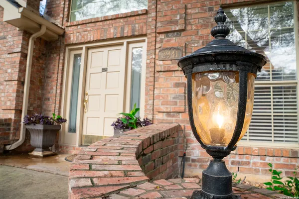 a view of balcony with wooden floor and fence
