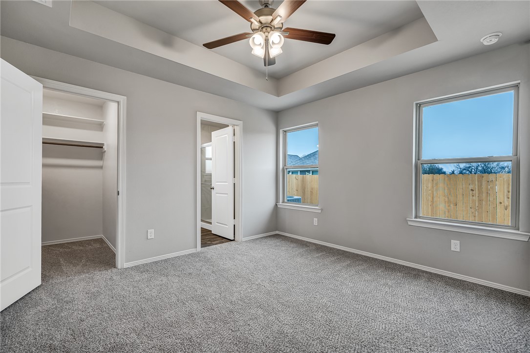 1231 High Street Navasota, TX 77868 - Photo 10 of 18 a view of an empty room with a window