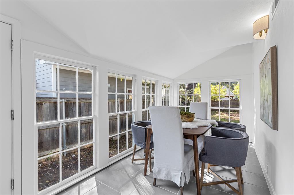 4723 El Campo Avenue Fort Worth, TX 76107 - Photo 12 of 21 a view of a dining room with furniture window and outside view