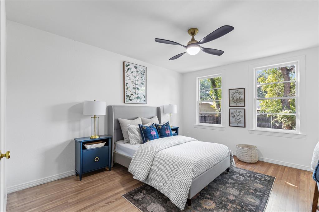 4723 El Campo Avenue Fort Worth, TX 76107 - Photo 18 of 21 a bedroom with a bed and window