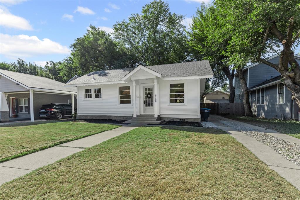 4723 El Campo Avenue Fort Worth, TX 76107 - Photo 2 of 21 a view of a yard in front of a house with large tree