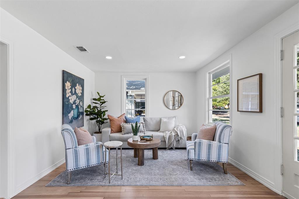 4723 El Campo Avenue Fort Worth, TX 76107 - Photo 5 of 21 a living room with furniture a clock on wall and a window