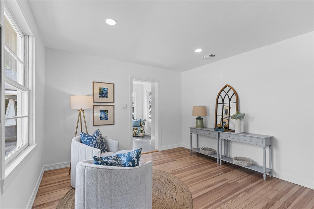 4723 El Campo Avenue Fort Worth, TX 76107 - Photo 6 of 21 a living room with furniture and a wooden floor