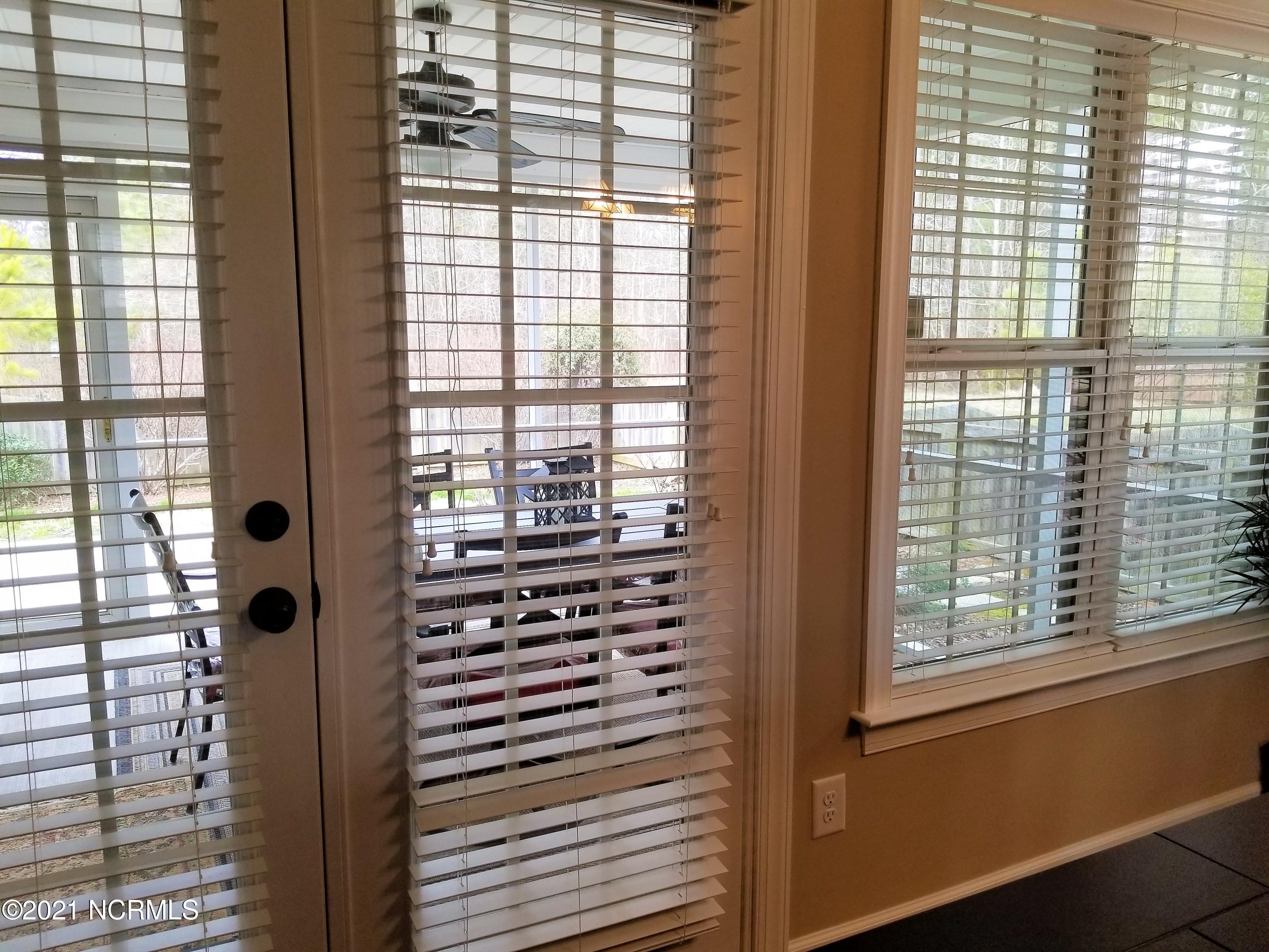 1870 Lansdowne Road Rocky Mount, NC 27804 - Photo 39 of 43 View of screened porch from DR