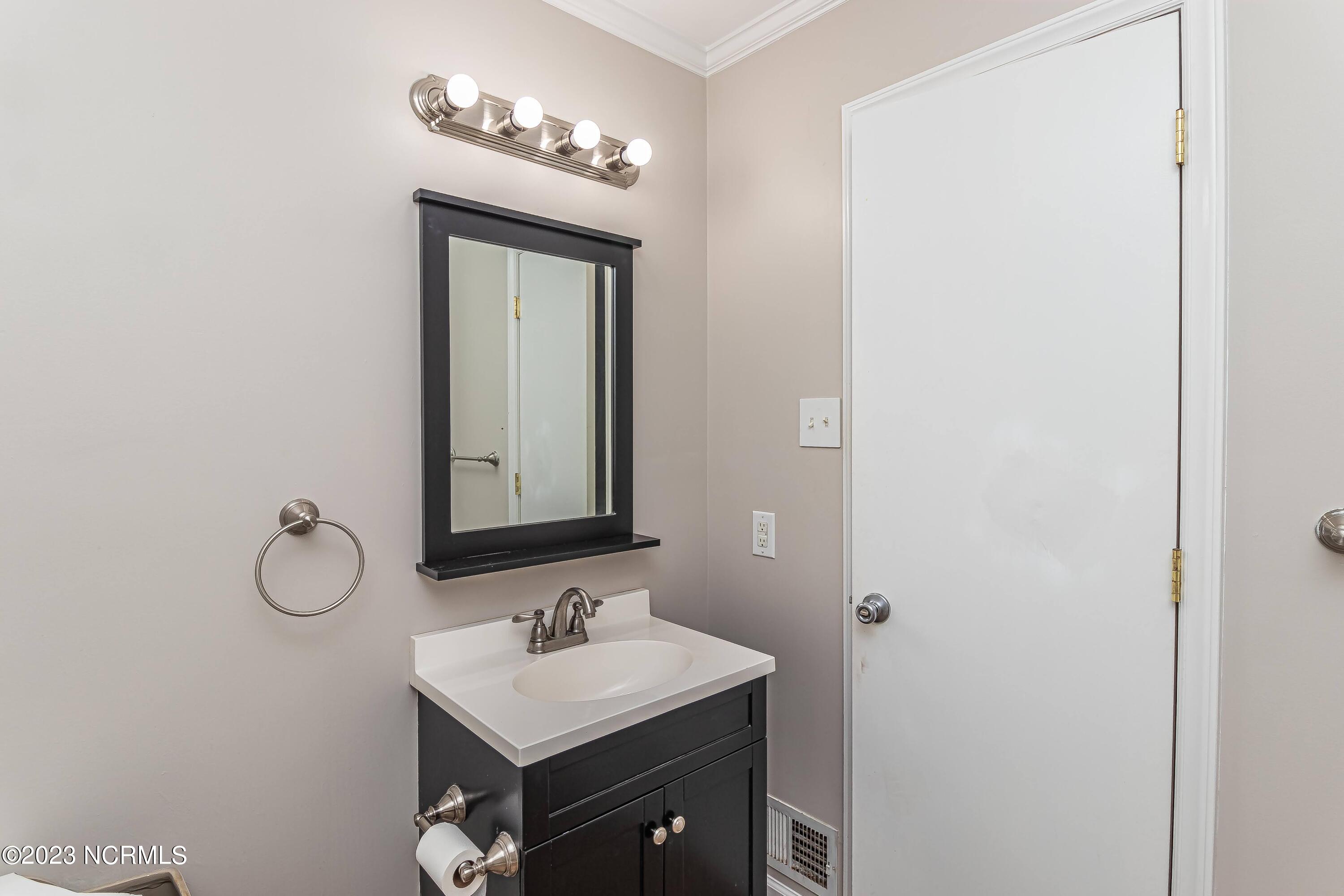 635 Winterlochen Road Raleigh, NC 27603 - Photo 21 of 28 Guest Bathroom