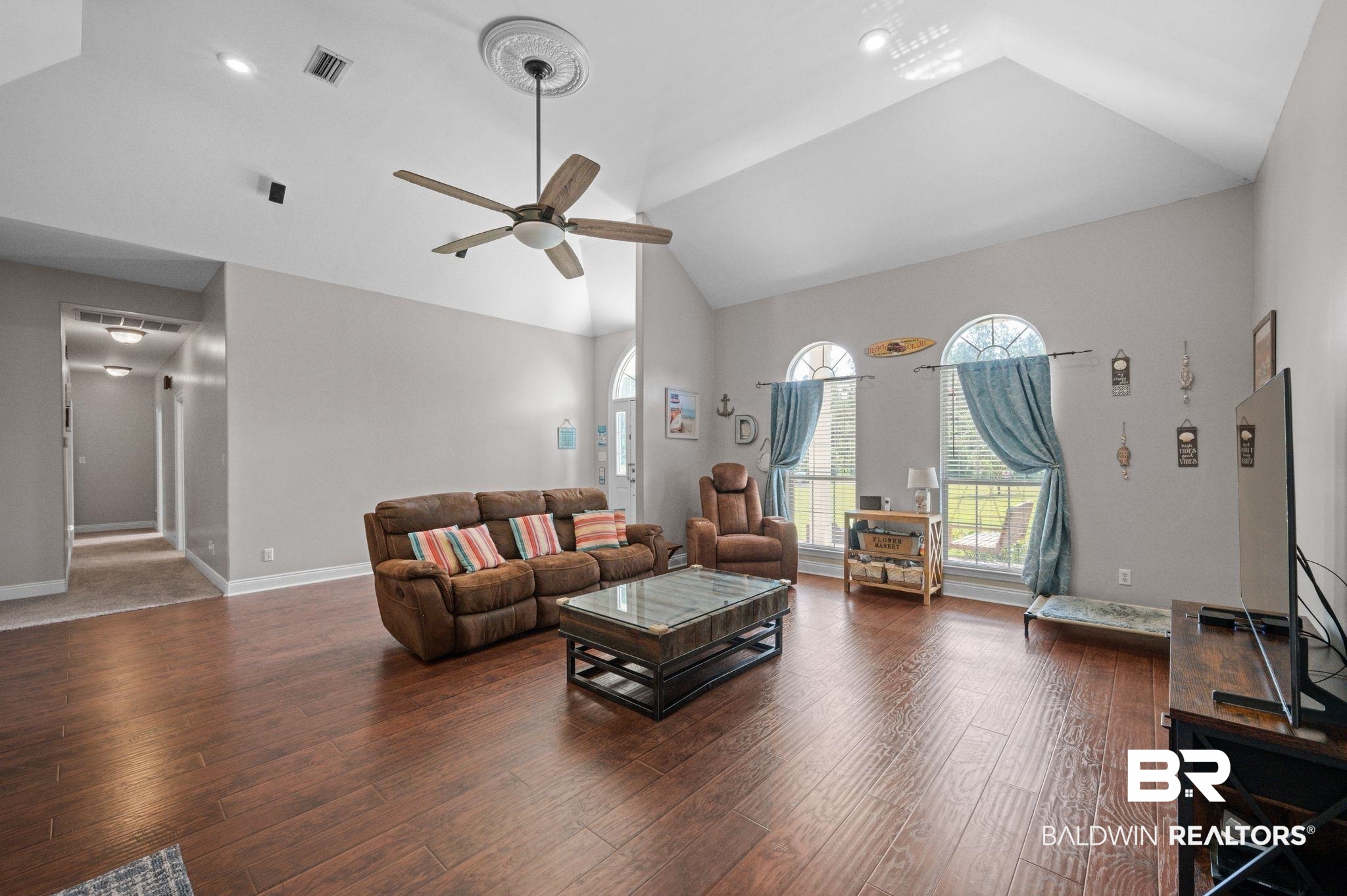 48513 Phillipsville Road Bay Minette, AL 36507 - Photo 10 of 50 Living room with high vaulted ceiling, ceiling fan, plenty of natural light, and wood finished floors