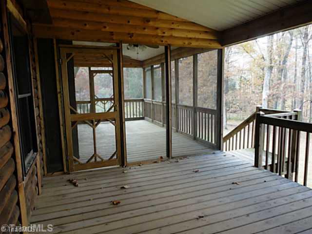 1136 Peabody Road Colfax, NC 27235 - Photo 13 of 16 Patio/Deck. Rear covered porch