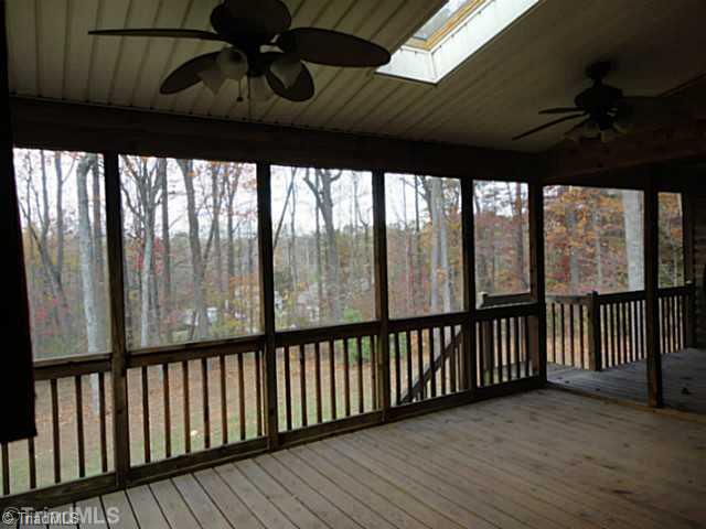 1136 Peabody Road Colfax, NC 27235 - Photo 14 of 16 Screened Porch. Rear Screened-in porch