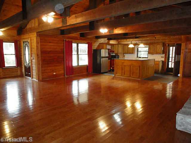 1136 Peabody Road Colfax, NC 27235 - Photo 16 of 16 Living Room. Gleaming hardwoods and open floorplan