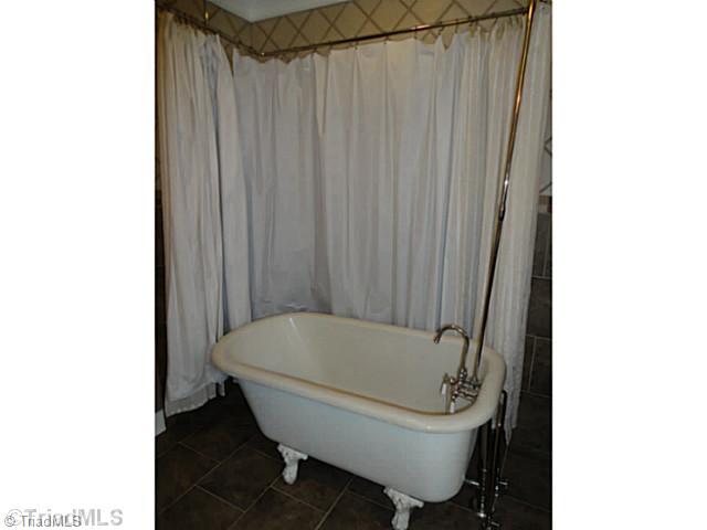 1136 Peabody Road Colfax, NC 27235 - Photo 7 of 16 Bath. Clawfoot tub with shower attachment