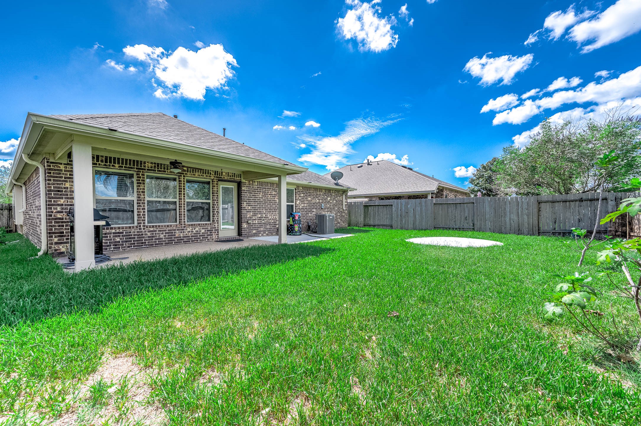 3050 Coreopsis Court Dickinson, TX 77539 - Photo 10 of 31 a view of a house with a backyard