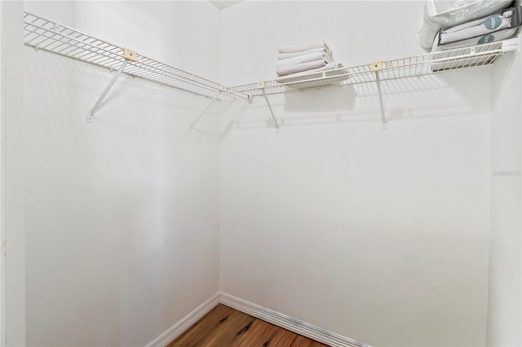 723 Bayport Way, Unit 723 Longboat Key, FL 34228 - Photo 28 of 67 a view of a room with racks on the wall