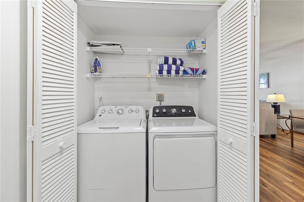 723 Bayport Way, Unit 723 Longboat Key, FL 34228 - Photo 29 of 67 a utility room with dryer and washer
