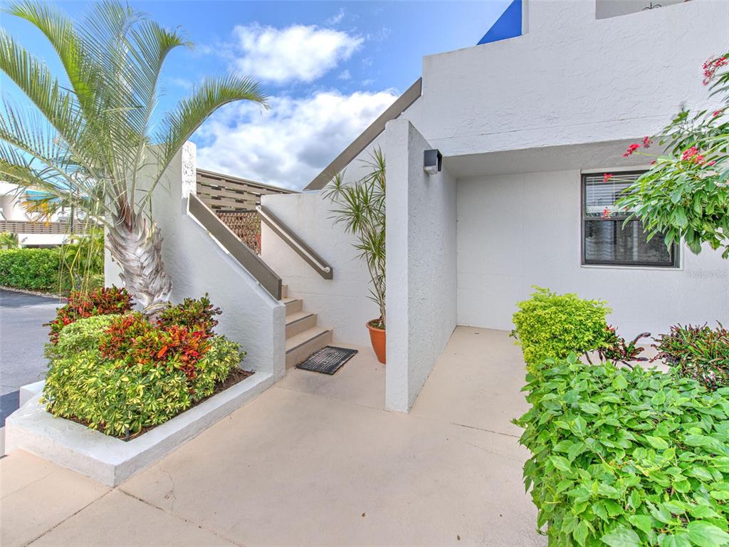 723 Bayport Way, Unit 723 Longboat Key, FL 34228 - Photo 4 of 67 a view of a backyard