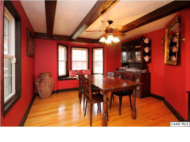 8607 3 Notch Road Louisa, VA 23093 - Photo 15 of 26 a view of a dining room with furniture and chandelier