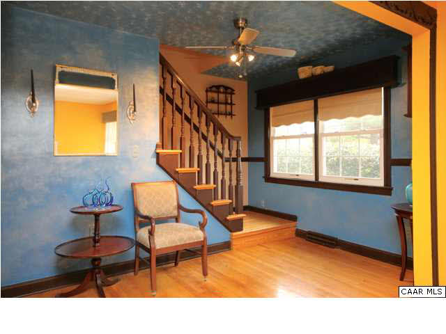 8607 3 Notch Road Louisa, VA 23093 - Photo 20 of 26 a balcony with chairs and a potted plant