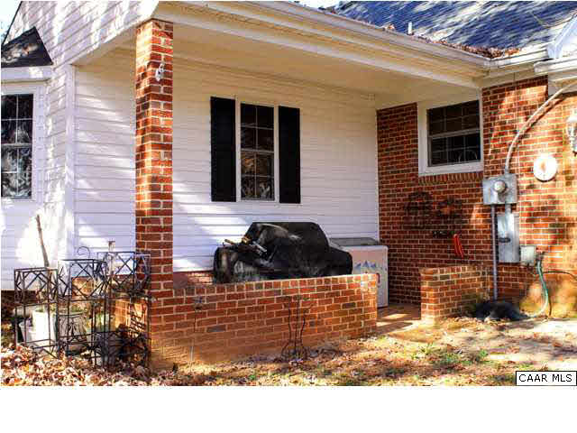 8607 3 Notch Road Louisa, VA 23093 - Photo 25 of 26 a view of a brick house with a window