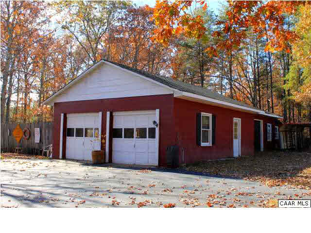 8607 3 Notch Road Louisa, VA 23093 - Photo 4 of 26 a front view of a house with a yard covered in snow