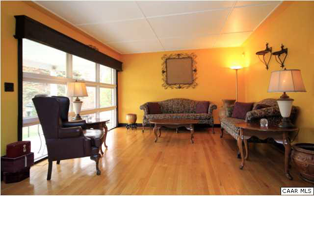 8607 3 Notch Road Louisa, VA 23093 - Photo 5 of 26 a living room with furniture and a large window