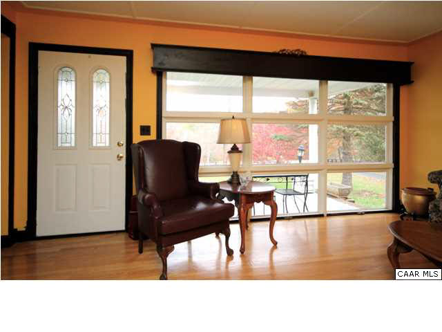 8607 3 Notch Road Louisa, VA 23093 - Photo 6 of 26 a living room with furniture and a large window