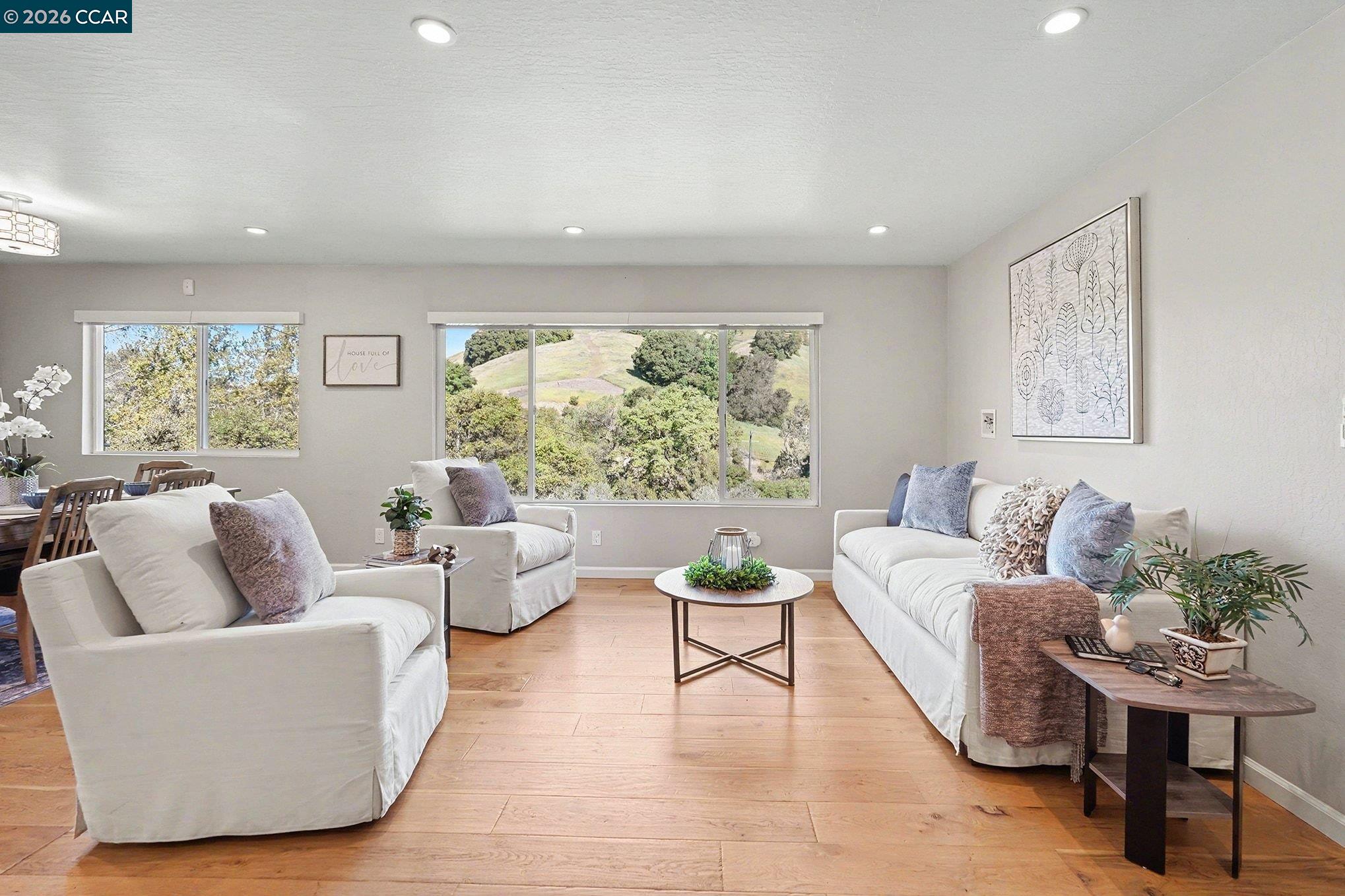 5745 Alhambra Valley Road Martinez, CA 94553 - Photo 11 of 47 a living room with furniture and a large window