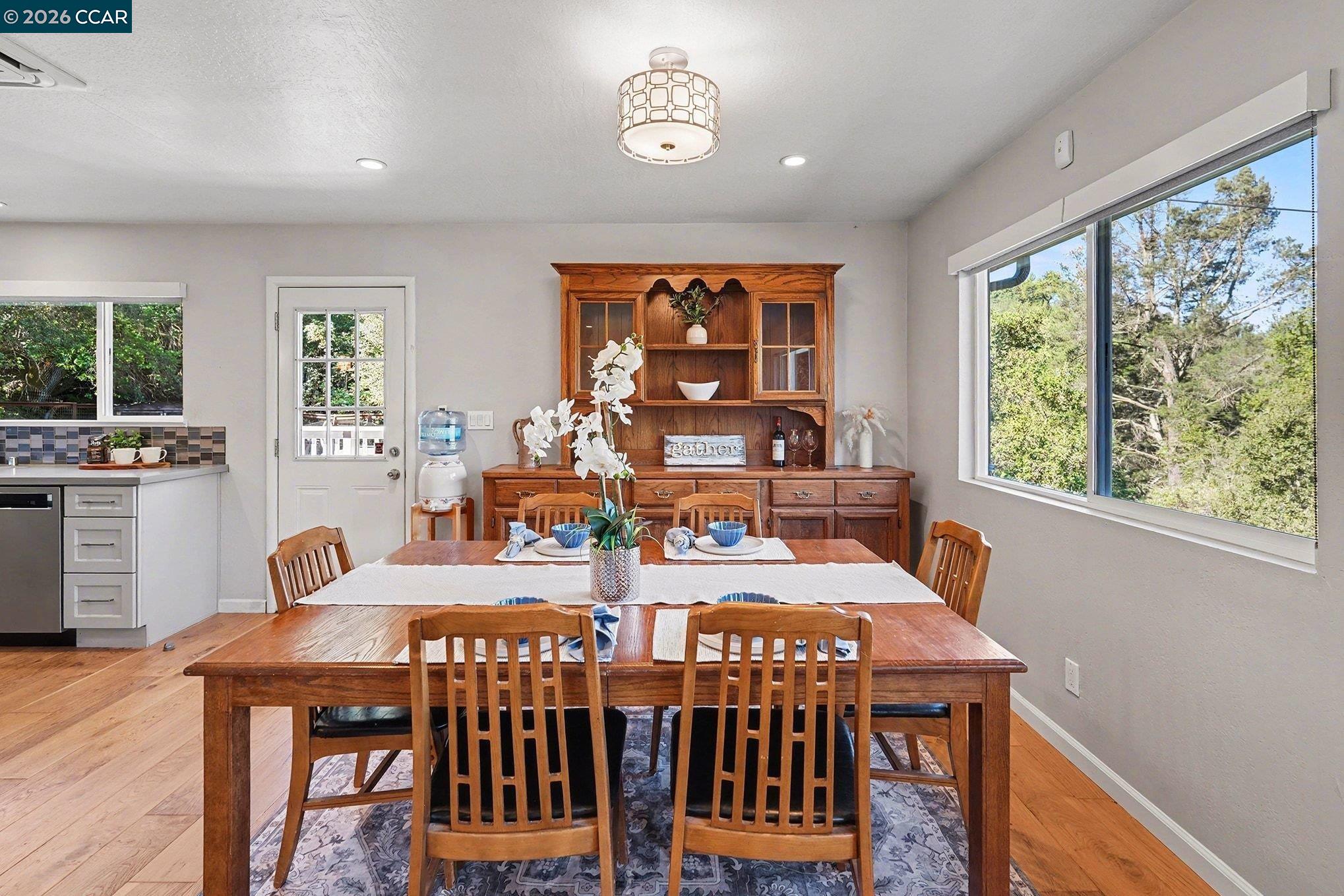5745 Alhambra Valley Road Martinez, CA 94553 - Photo 19 of 47 a view of a dining room with furniture window and outside view