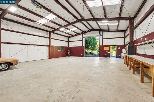 a view of an empty room with a couch