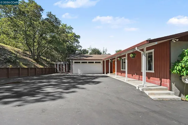 a view of a house with a patio