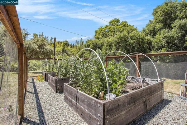 a view of a couches on the roof deck