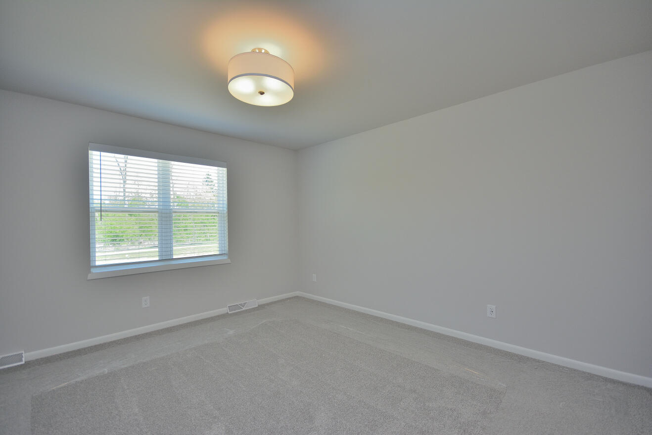 802 5 Mile Road Caledonia, WI 53402 - Photo 10 of 27 Primary Bedroom