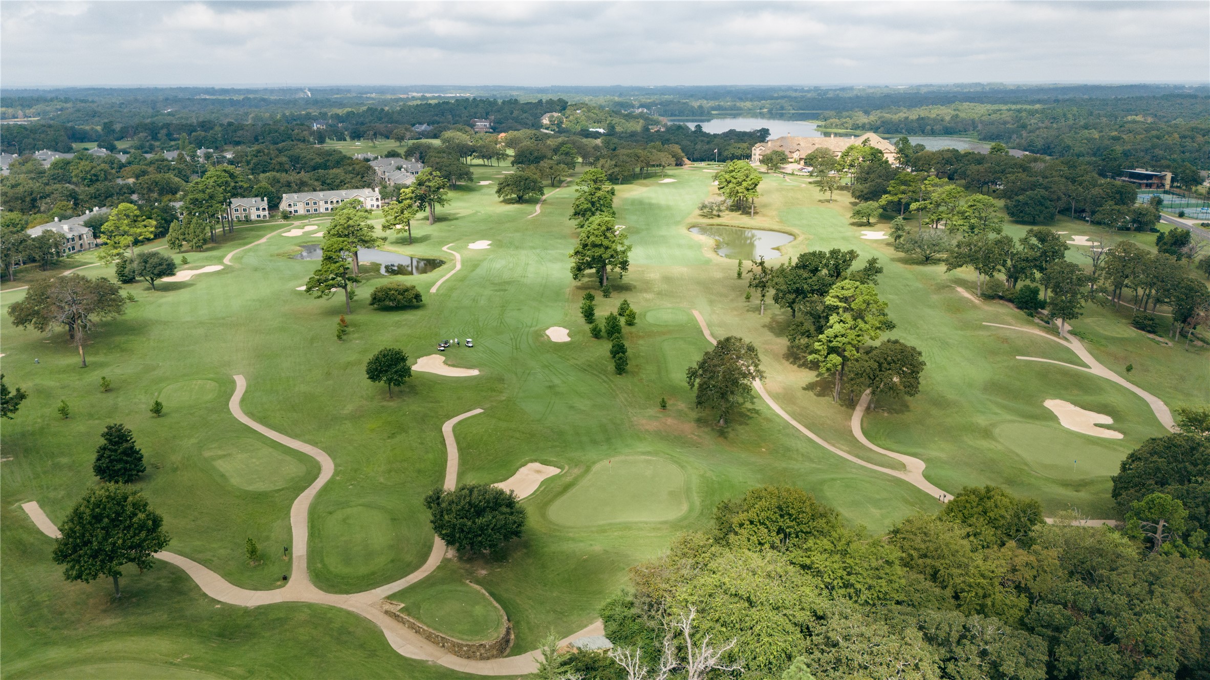 2835 Stewart Way Tyler, TX 75709 - Photo 4 of 11 an aerial view of residential houses with outdoor space