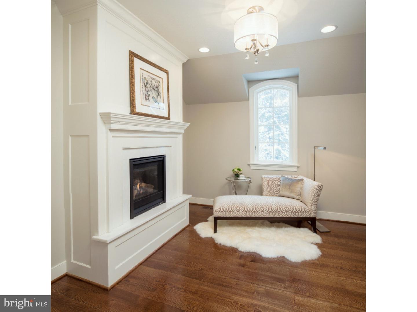 220 South Waterloo Road Devon, PA 19333 - Photo 12 of 13 a living room with furniture and a fireplace