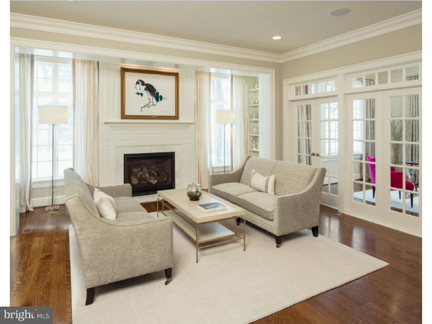 220 South Waterloo Road Devon, PA 19333 - Photo 4 of 13 a living room with furniture and a fireplace