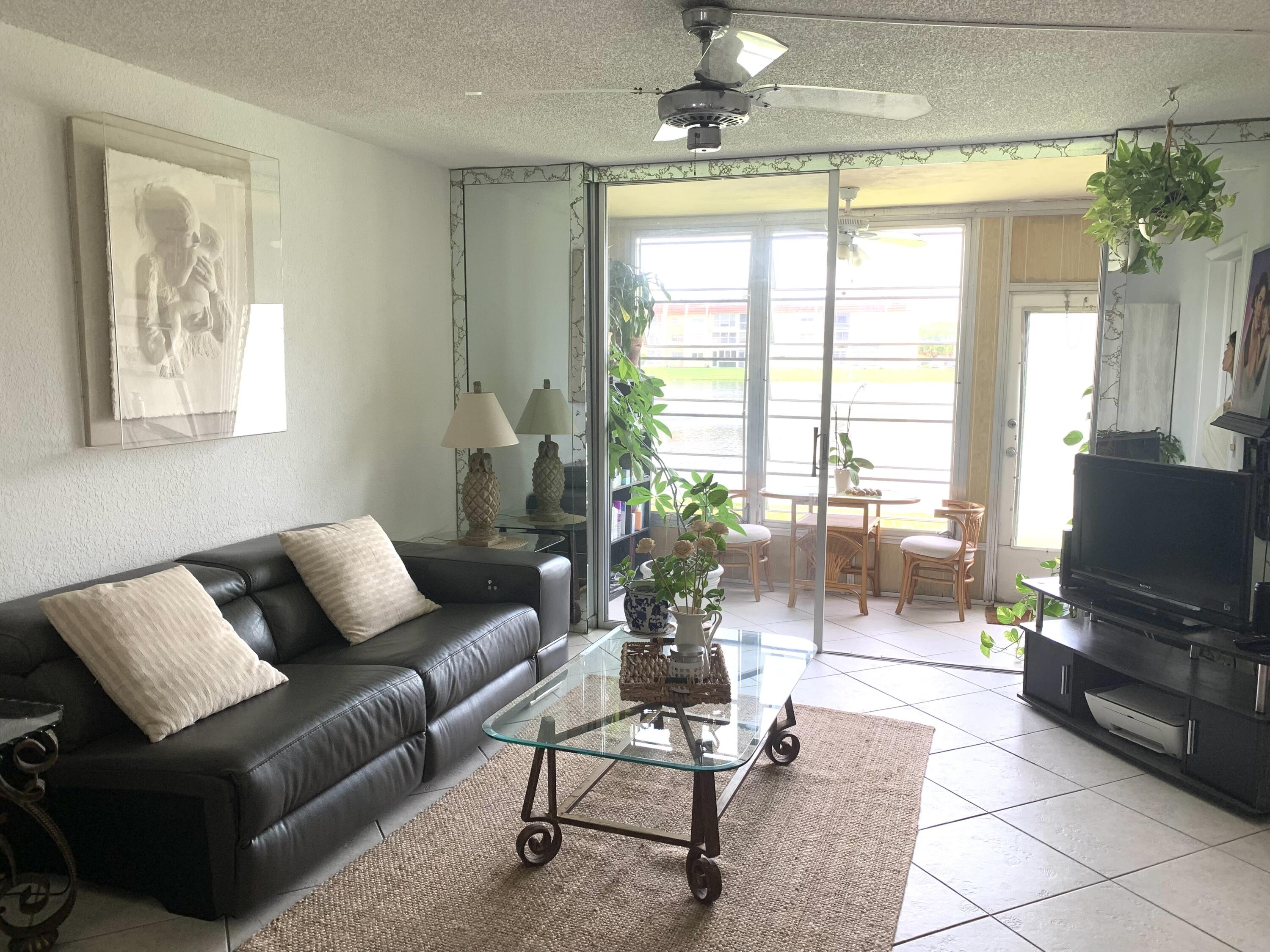 2801 North Pine Island Road, Unit 110 Sunrise, FL 33322 - Photo 3 of 26 IMG_2885 salotto