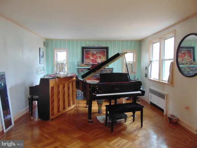 a living room with furniture and a windows